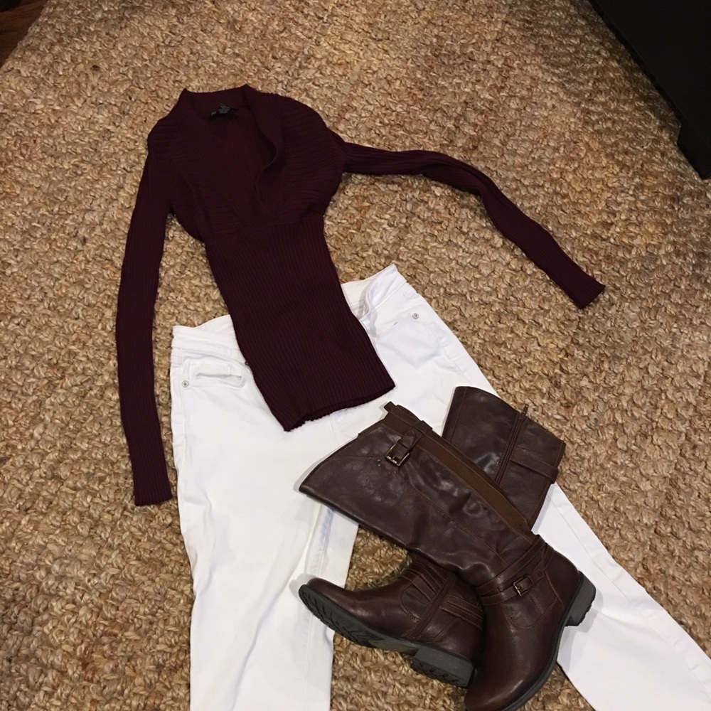 Fitted burgundy v-neck sweater.